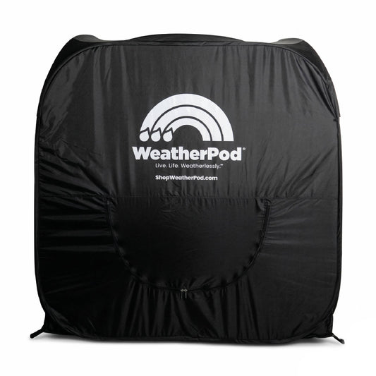 The back of a black MegaPod Plus WeatherPod pop-up rain shelter with a white printed logo shown on a plain white background with a back zipper vent.