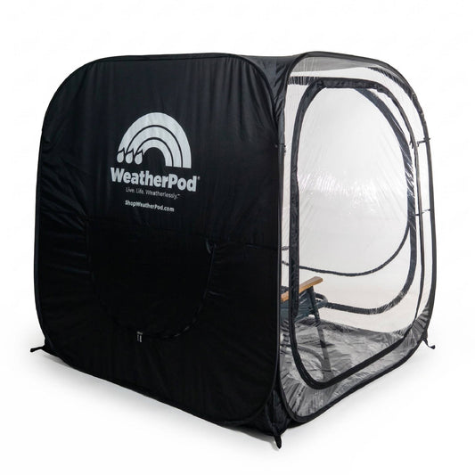A black MegaPod Plus WeatherPod pop-up rain shelter tent with clear PVC shown on a white background.